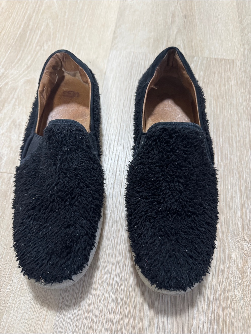 UGG Women's Black Fuzzy Slip-On Loafers